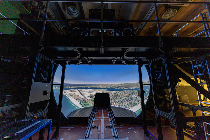 Pilatus PC-7 MKX Flight Training Device with a 4-metre dome showing a projected coastal airfield, with Norxe P60 projectors mounted on the frame above